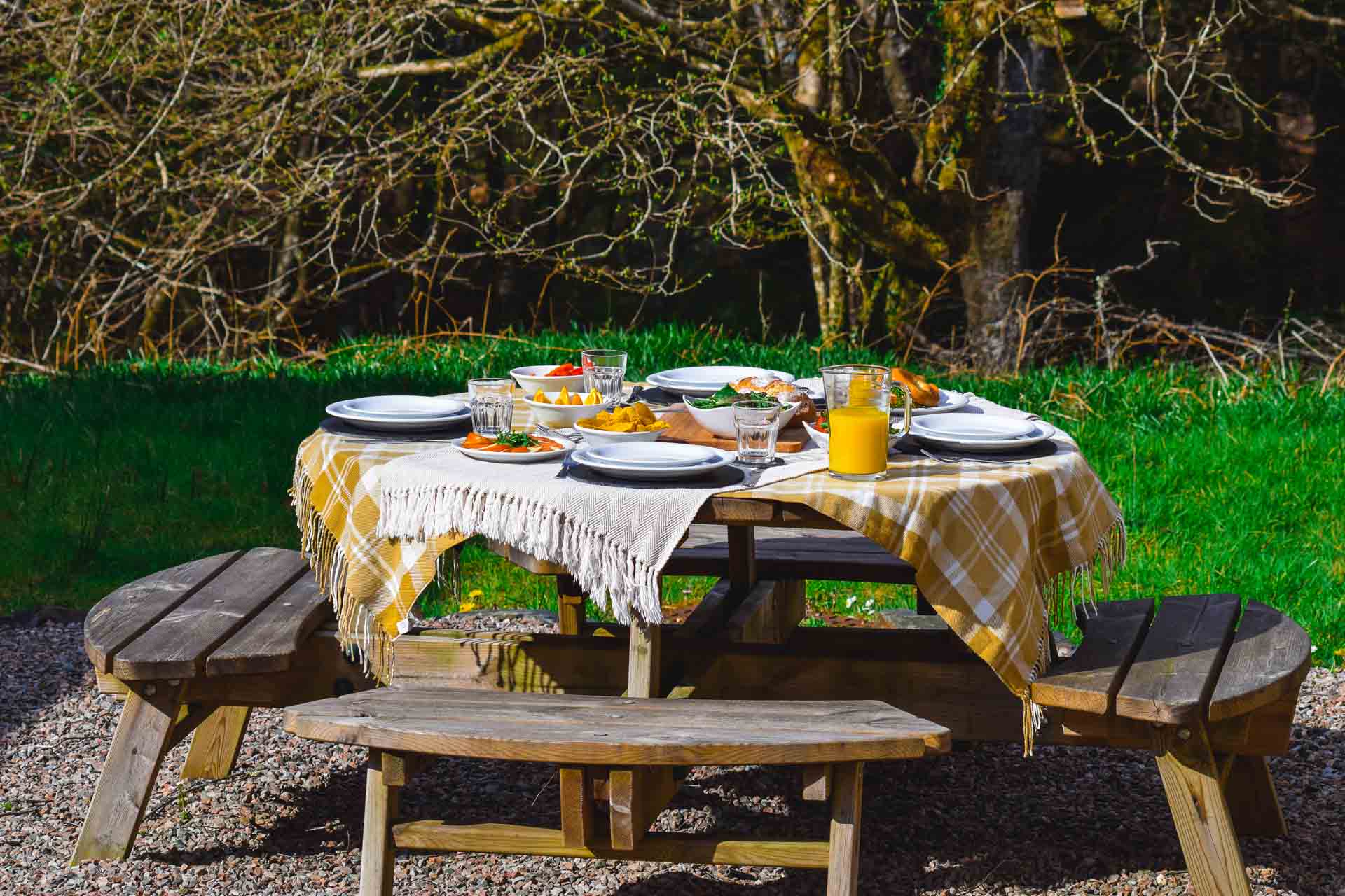Lunch in the sun on one of the picnic tables at Birchbrae Highland Lodges, near Glencoe & Fort William.
